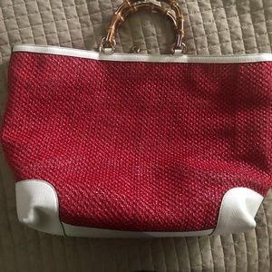 Gucci leather and red woven and wood handles bag!